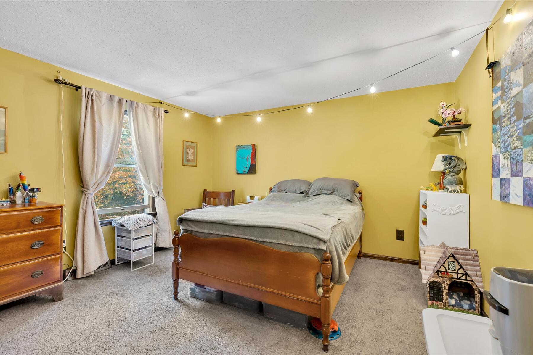 7 Sandy Way Mashpee, MA 02649 - Photo 19 of 41 a bedroom with a bed and a window