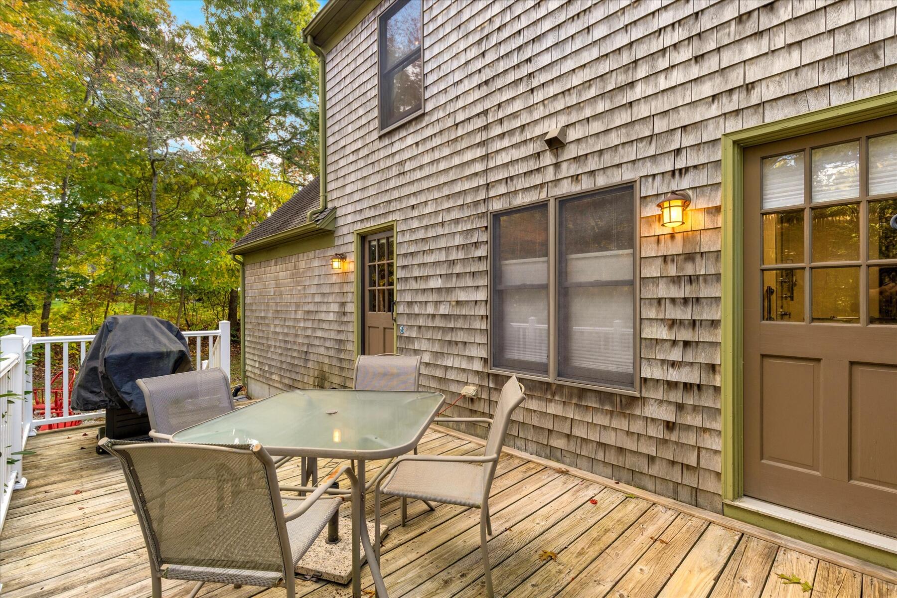 7 Sandy Way Mashpee, MA 02649 - Photo 26 of 41 a view of a house with backyard and sitting area