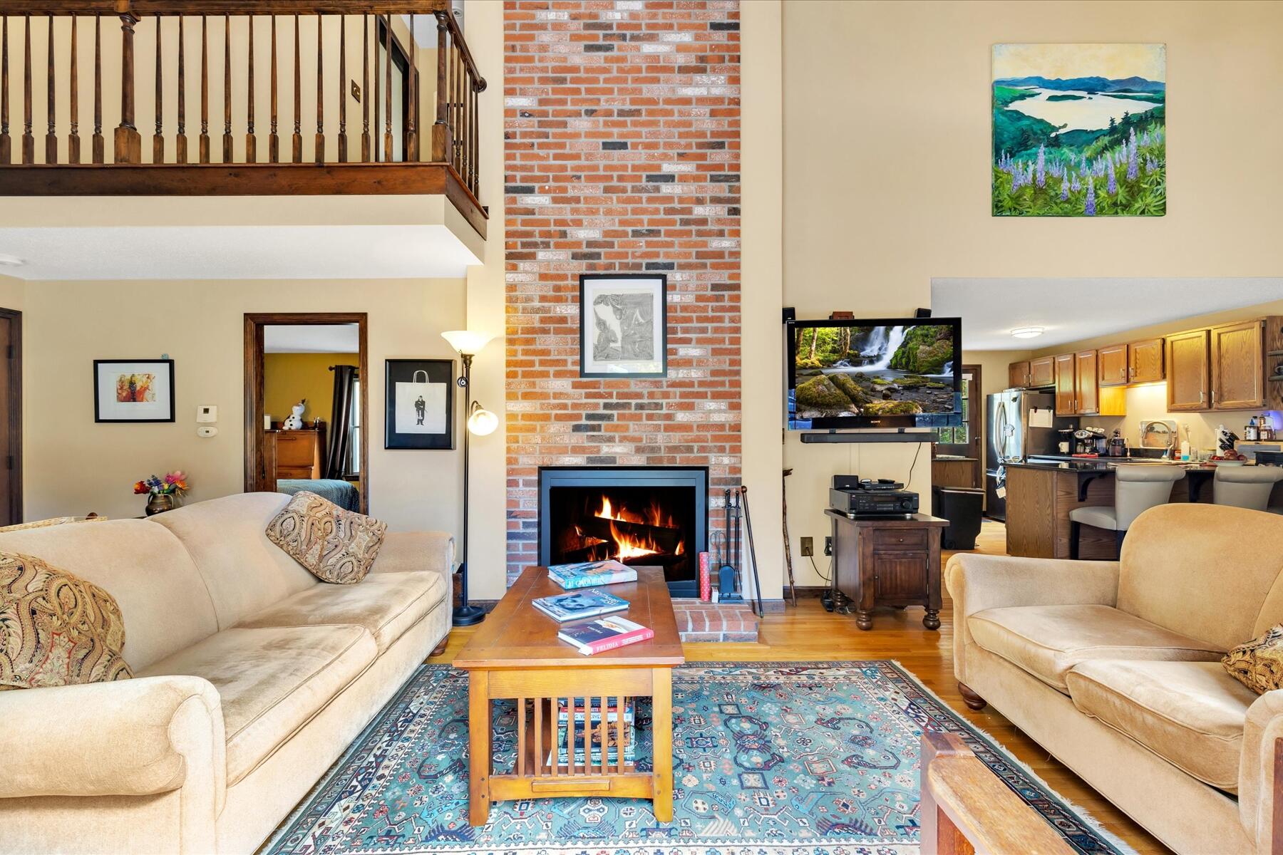 7 Sandy Way Mashpee, MA 02649 - Photo 3 of 41 a living room with furniture fireplace and a flat screen tv
