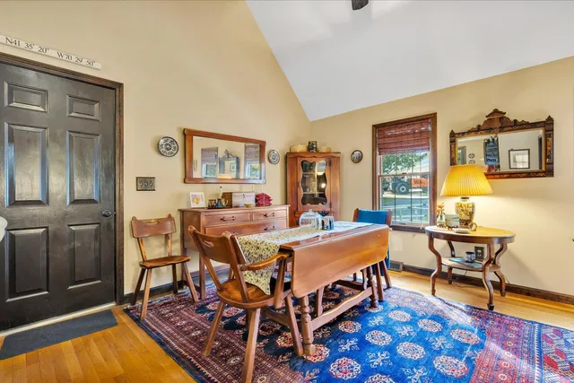 a bed room with a bed and a table