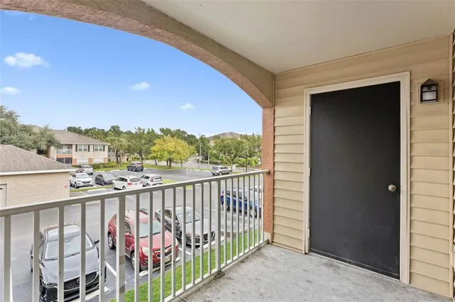 a view of a balcony with city view