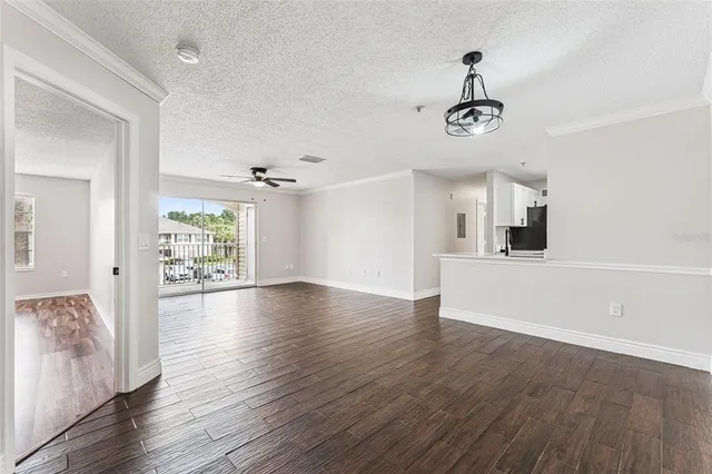 a view of a livingroom with wooden floor