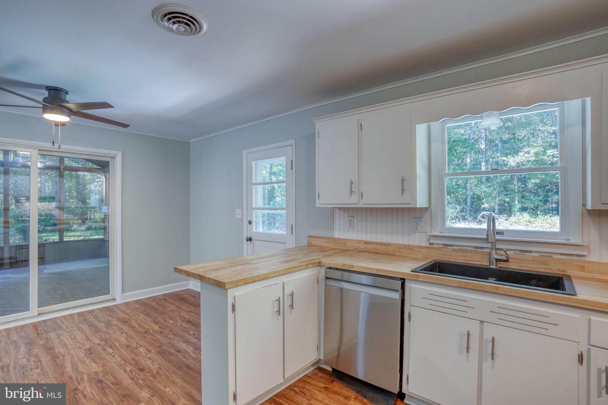 4570 Evergreen Road Oxford, MD 21654 - Photo 17 of 27 a kitchen that has a sink and a window