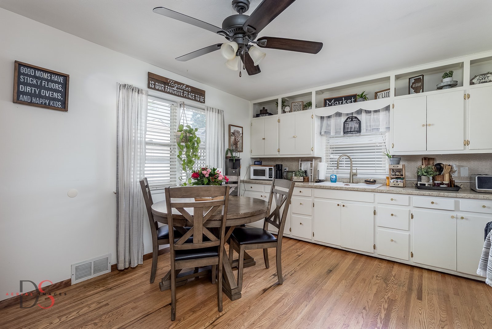 620 York Street Ottawa, IL 61350 - Photo 5 of 17 a view of a dining room with furniture window and wooden floor