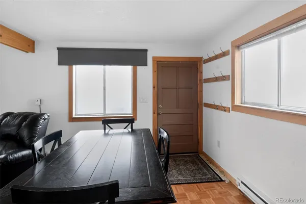 a room with chairs and a table