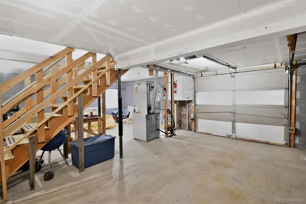 a view of an empty room with gym equipment