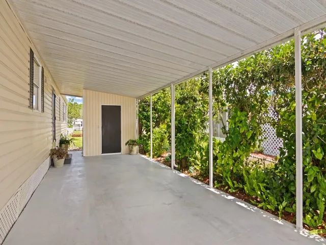a view of a backyard of the house