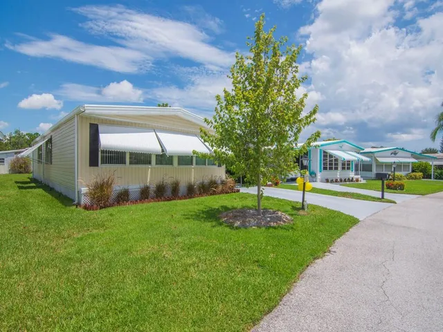 a view of a house with a park