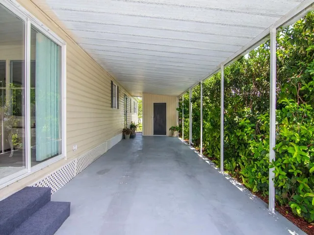 a view of a back yard of the house