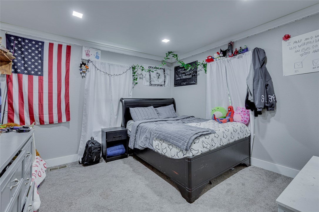 110 Avondale Road Anderson, SC 29624 - Photo 12 of 26 A comfortable bedroom with plush carpeting and natural light for restful living.