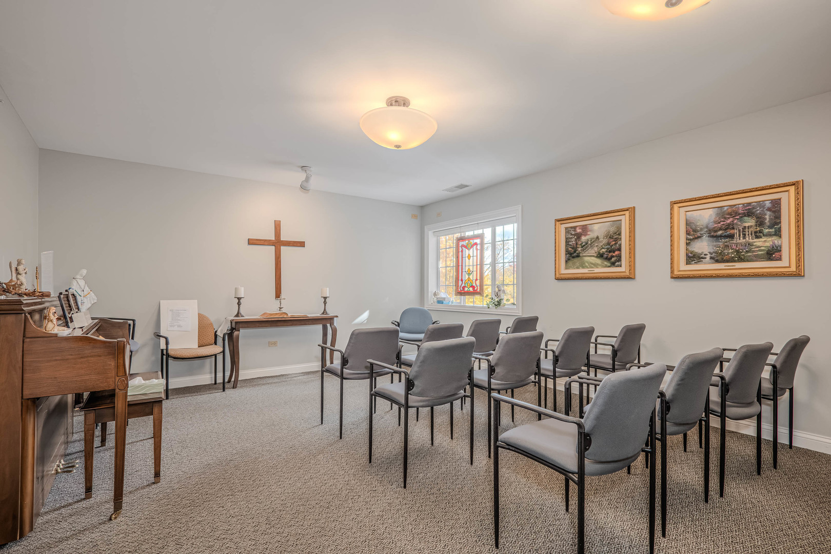801 North McLean Boulevard, Unit 320 Elgin, IL 60123 - Photo 27 of 37 a view of a dining room with furniture and chandelier