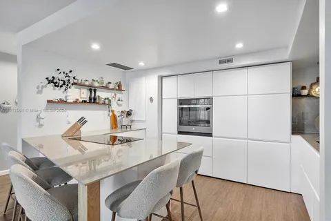 a view of a hallway with windows