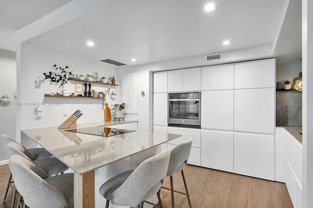 a view of a hallway with windows