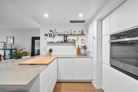 a view of living room with furniture and window