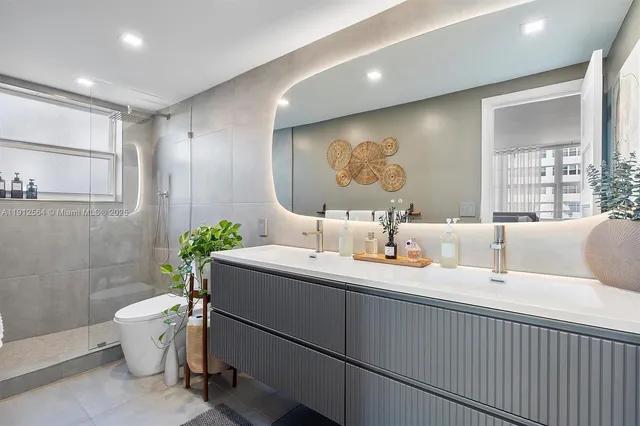 a bathroom with a toilet and a sink