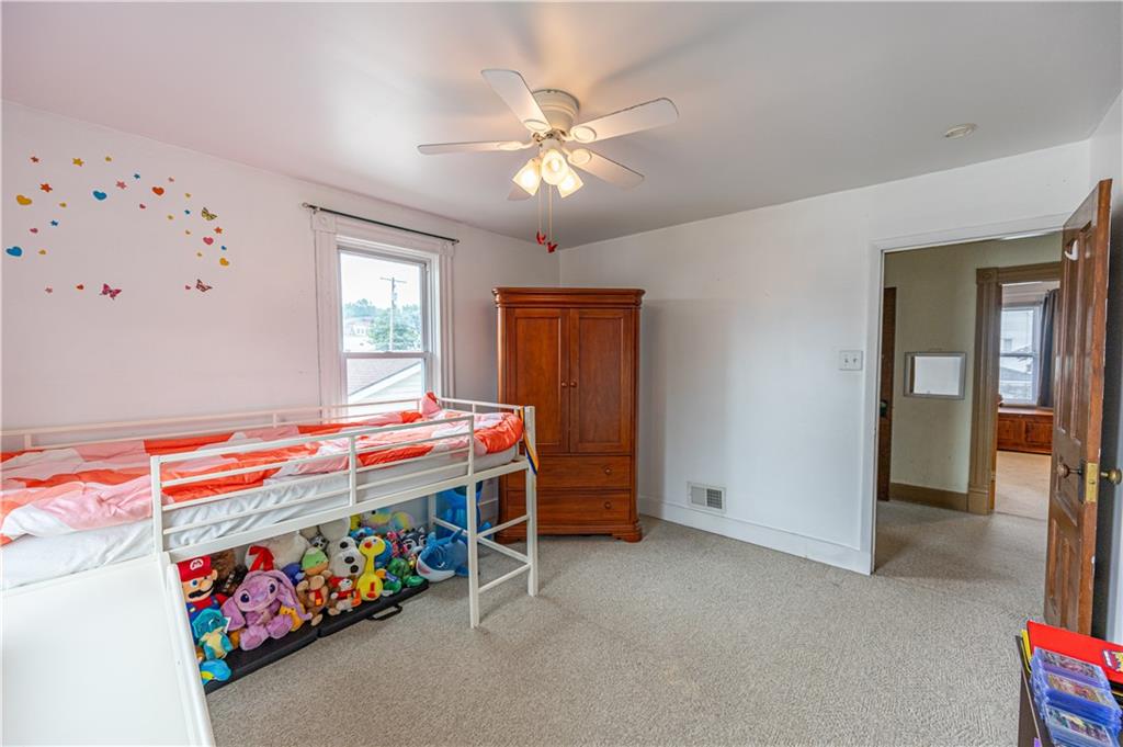 201 Walters Lane Springdale, PA 15144 - Photo 18 of 24 a room with toys and ceiling fan