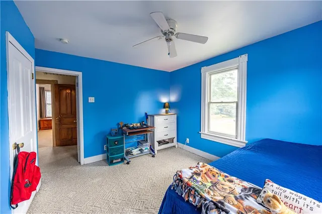 a bed room with a bed and a couch