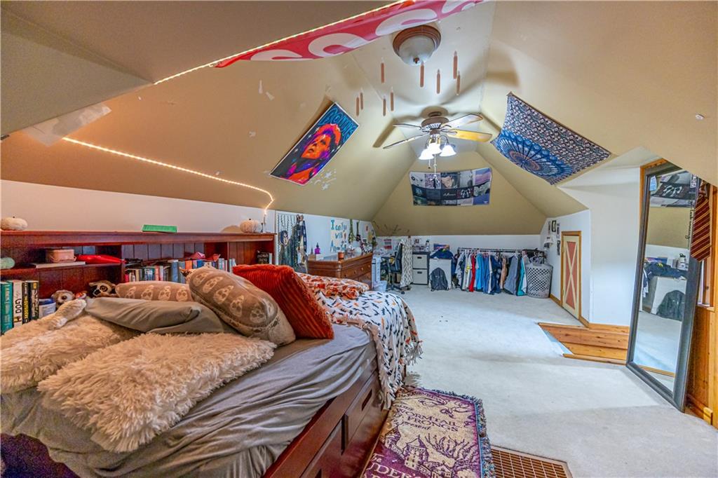 201 Walters Lane Springdale, PA 15144 - Photo 22 of 24 a living room with furniture and a rug