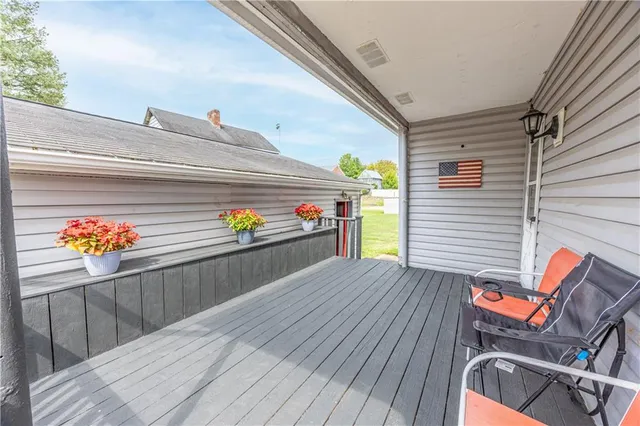 a view of a house with a yard and garage