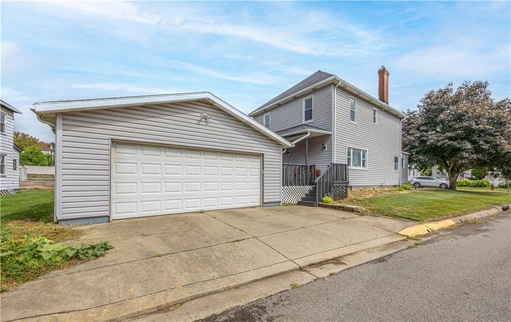 201 Walters Lane Springdale, PA 15144 - Photo 24 of 24 a view of a house with a yard and garage