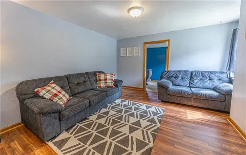 a living room with furniture and a couch