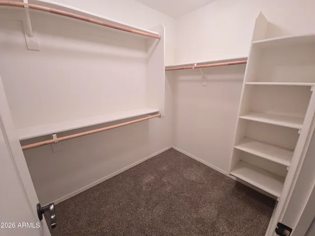a bathroom with a sink vanity and a mirror