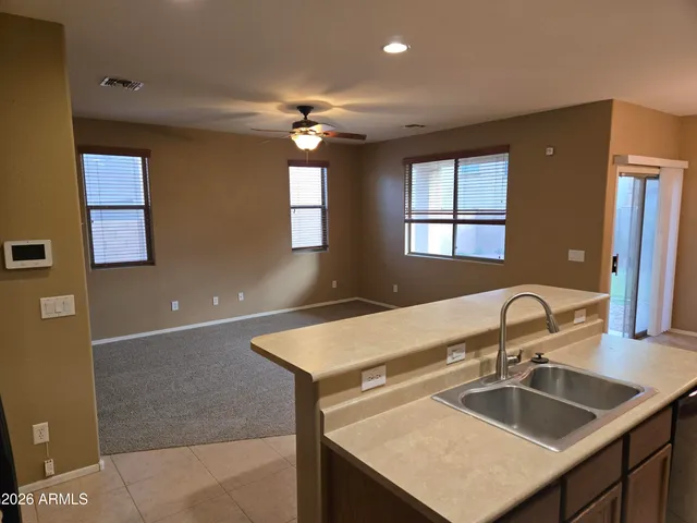 a view of a back yard of the house