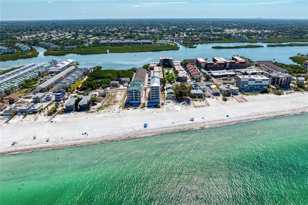 19730 Gulf Boulevard, Unit 400 Indian Rocks Beach, FL 33785 - Photo 85 of 90 aerial view of a house with a garden and lake view