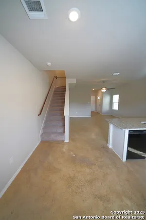 a view of a room with a staircase