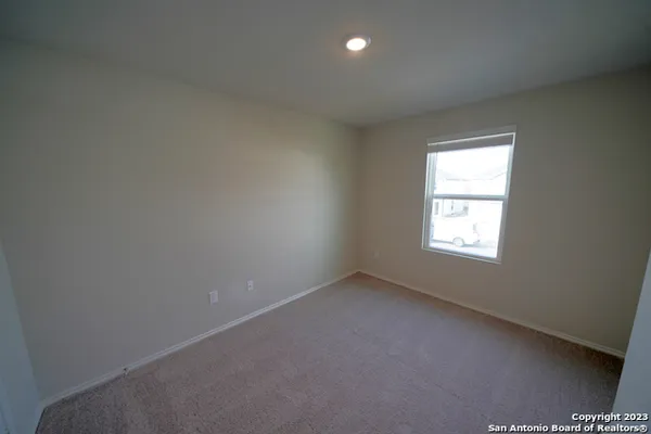 an empty room with a window
