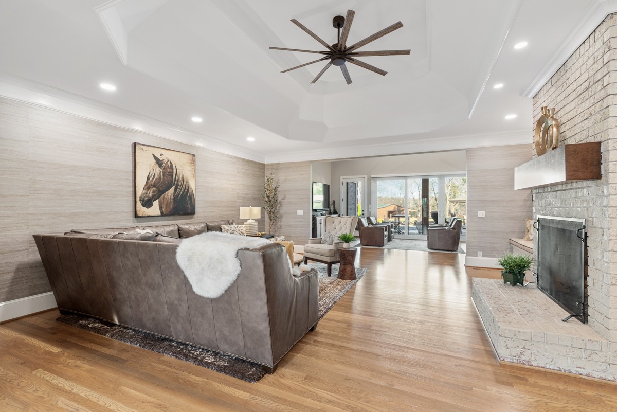 750 Upper Station Camp Creek Road Cottontown, TN 37048 - Photo 14 of 71 a living room with furniture and a fireplace