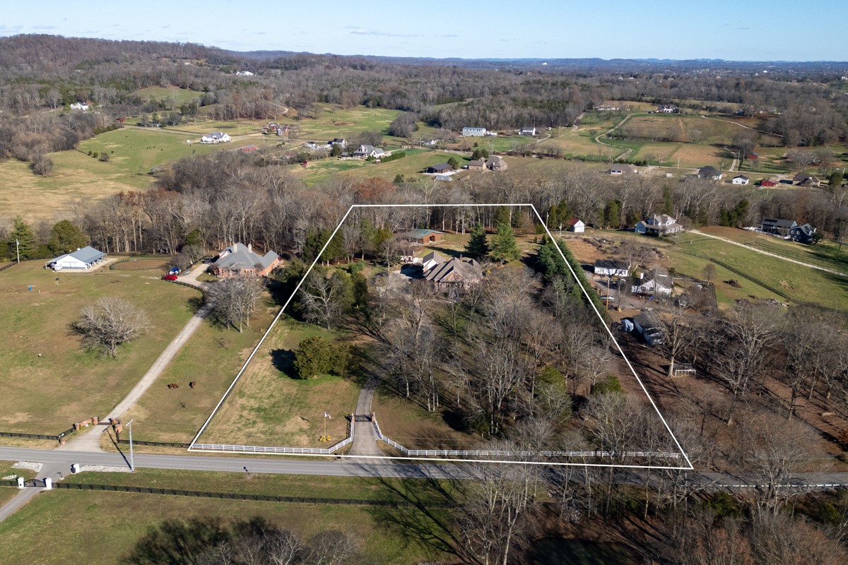 750 Upper Station Camp Creek Road Cottontown, TN 37048 - Photo 2 of 71 an aerial view of a house with a yard