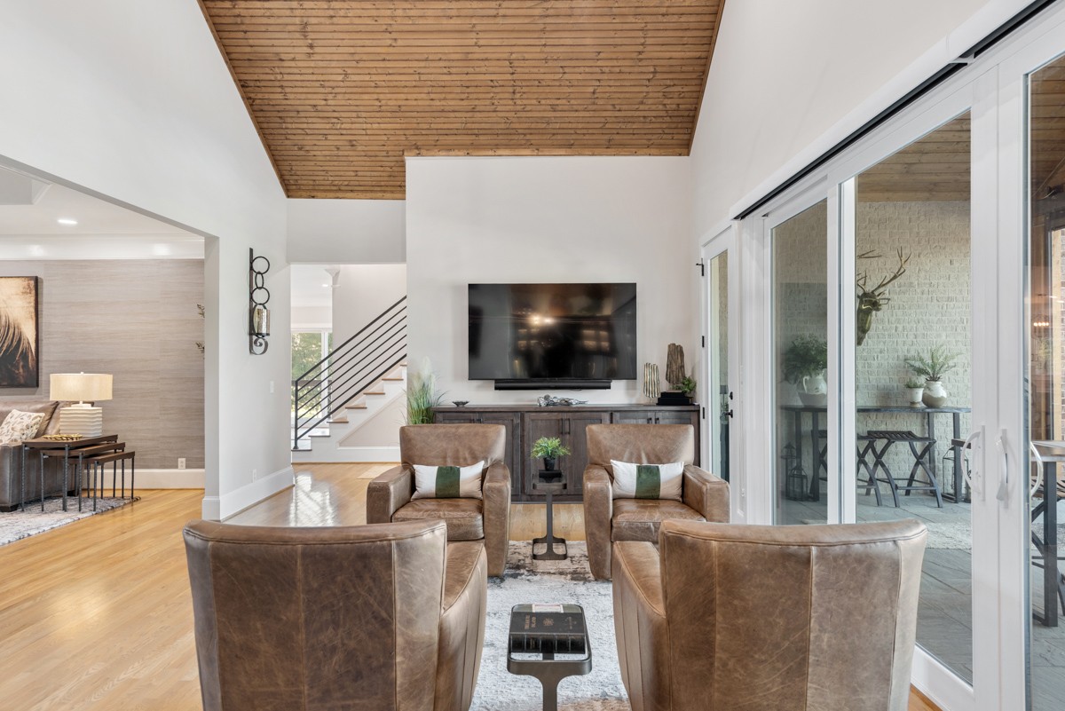 750 Upper Station Camp Creek Road Cottontown, TN 37048 - Photo 21 of 71 a living room with furniture and a flat screen tv