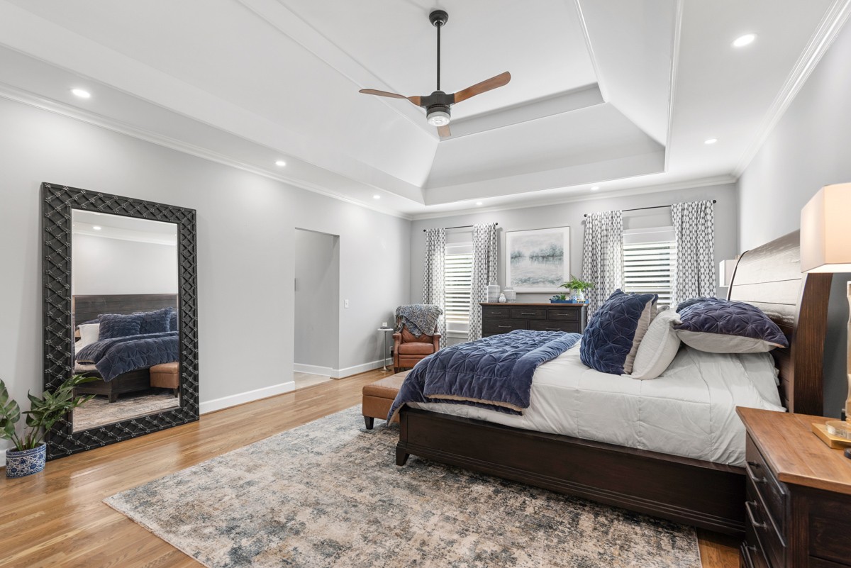 750 Upper Station Camp Creek Road Cottontown, TN 37048 - Photo 34 of 71 a bedroom with a large bed and a window