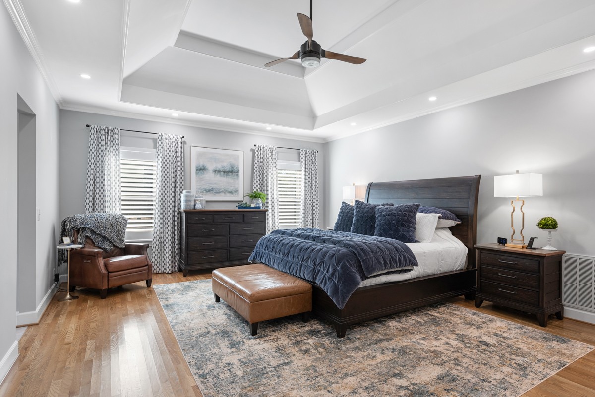 750 Upper Station Camp Creek Road Cottontown, TN 37048 - Photo 35 of 71 a bedroom with a bed and wooden floor