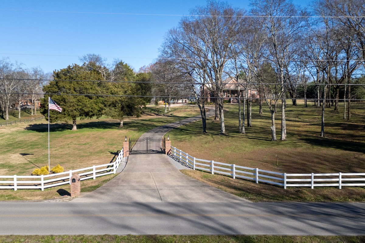 750 Upper Station Camp Creek Road Cottontown, TN 37048 - Photo 4 of 71 a view of a swimming pool with a bench in the patio