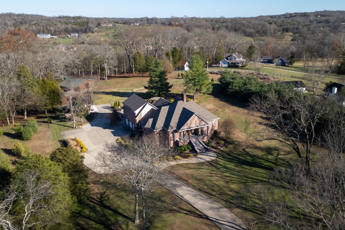 750 Upper Station Camp Creek Road Cottontown, TN 37048 - Photo 5 of 71 a view of a lake with a mountain in the back