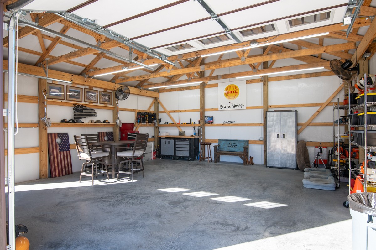 750 Upper Station Camp Creek Road Cottontown, TN 37048 - Photo 61 of 71 a view of a garage with chairs