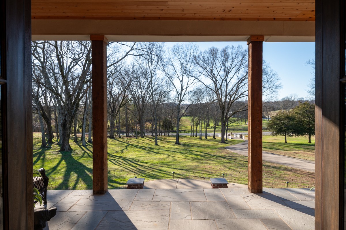 750 Upper Station Camp Creek Road Cottontown, TN 37048 - Photo 8 of 71 a view of a park with swings and a backyard