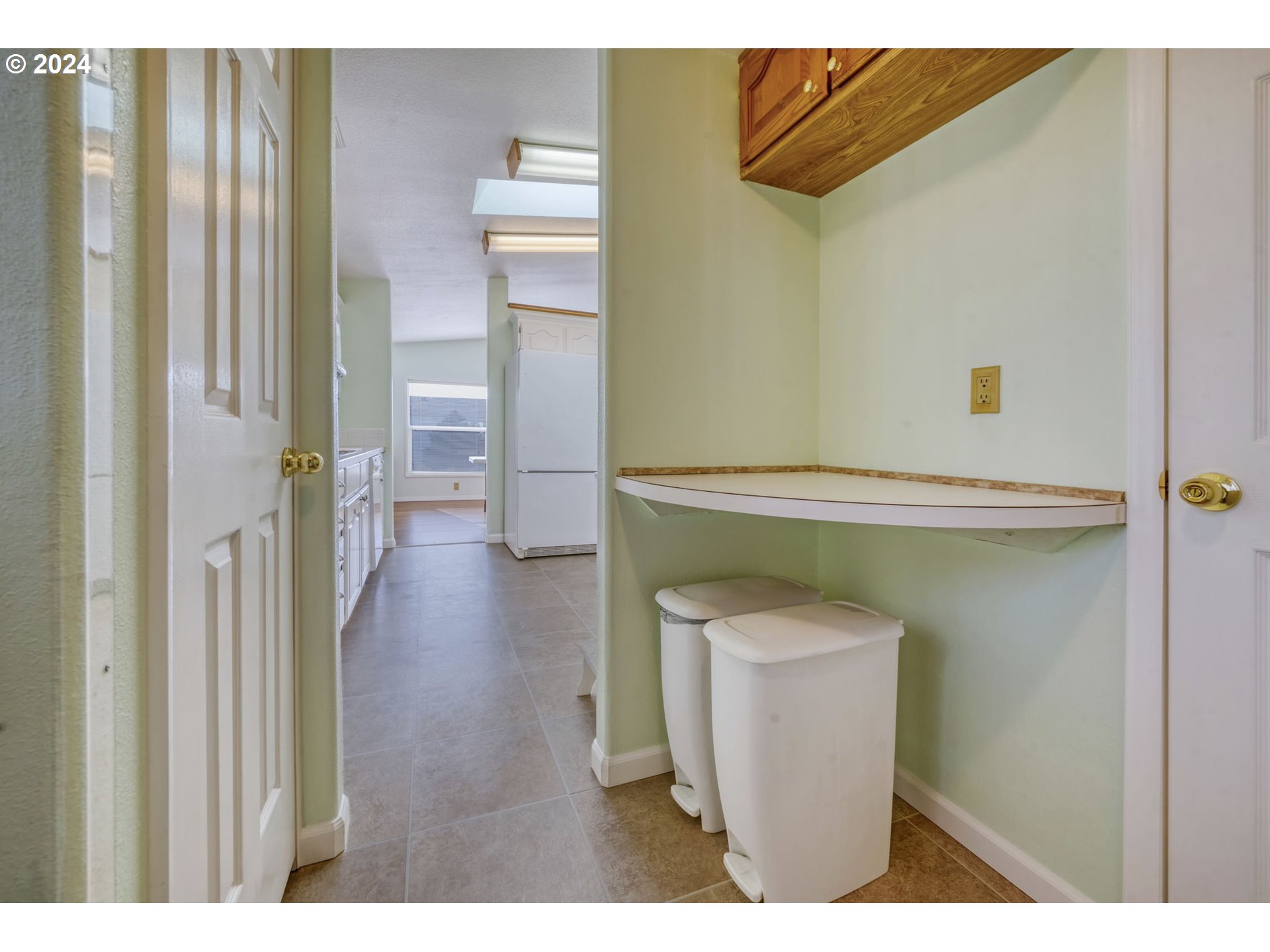 2150 Laura Street, Unit 217 Springfield, OR 97477 - Photo 27 of 32 a view of hallway with wooden floor