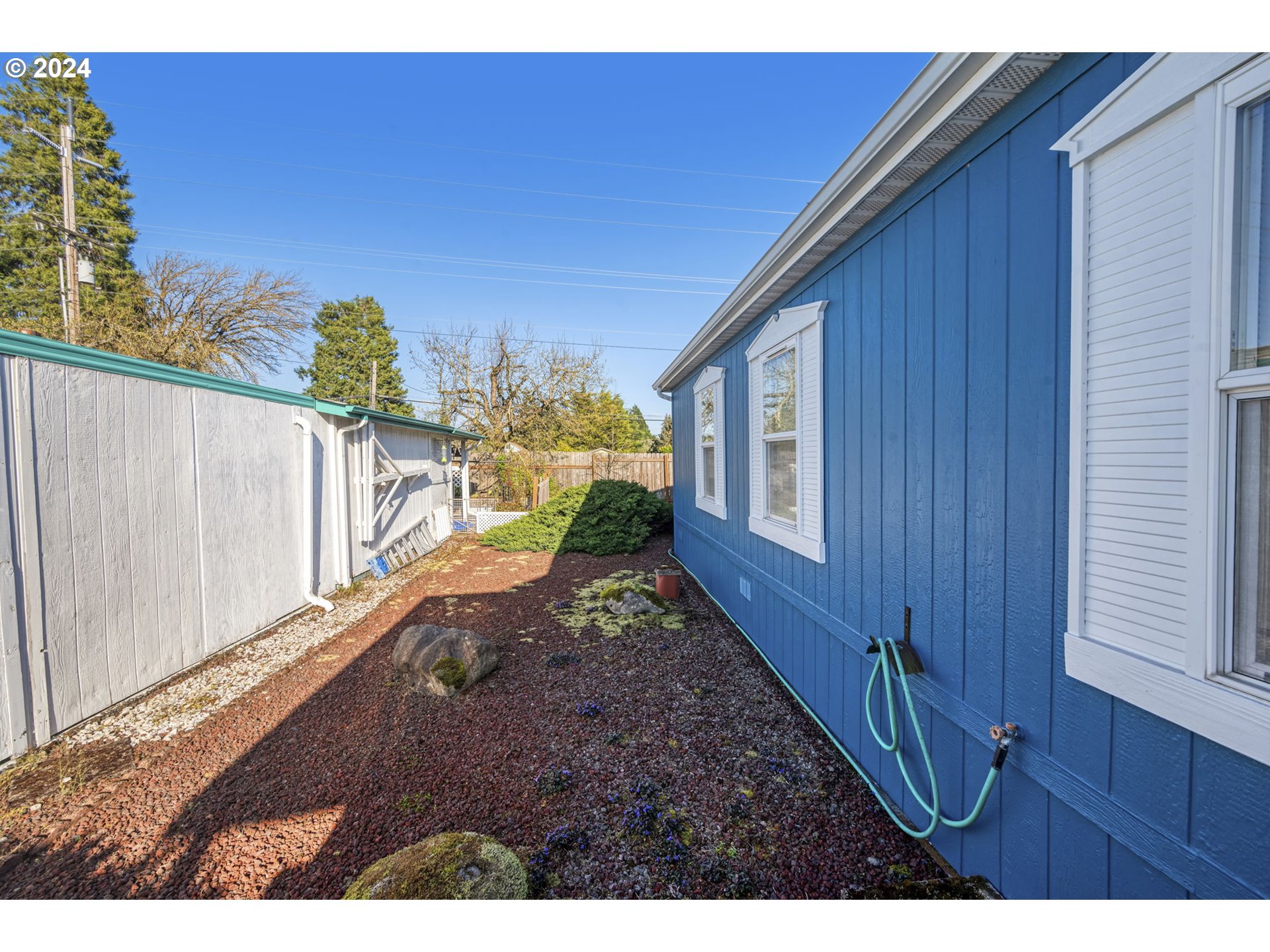 2150 Laura Street, Unit 217 Springfield, OR 97477 - Photo 31 of 32 a view of a backyard with pathway