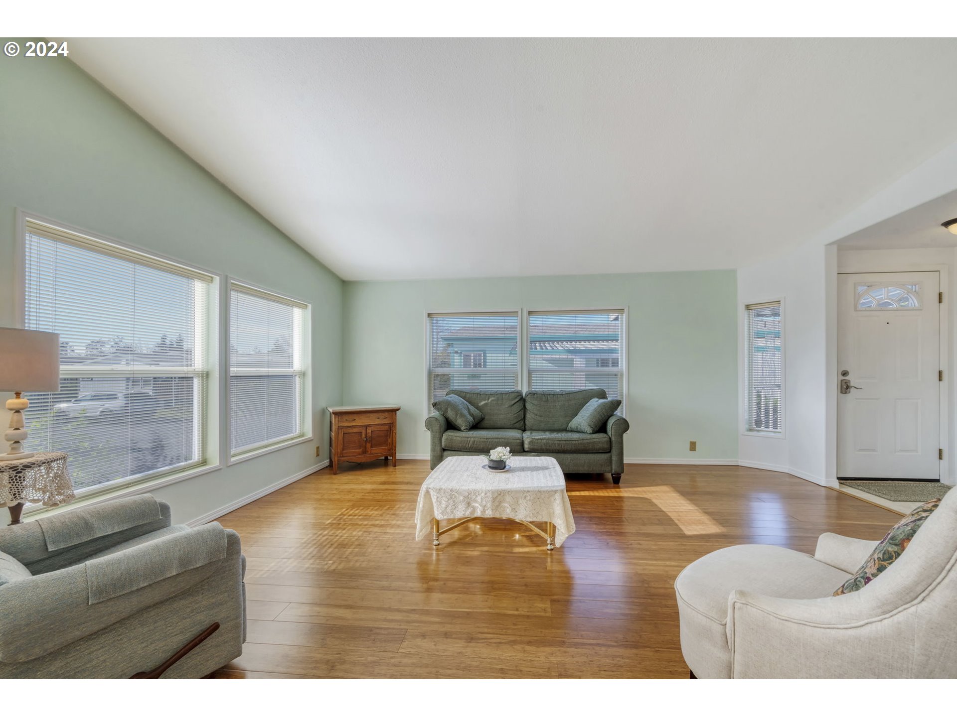2150 Laura Street, Unit 217 Springfield, OR 97477 - Photo 6 of 32 a living room with furniture and a large window