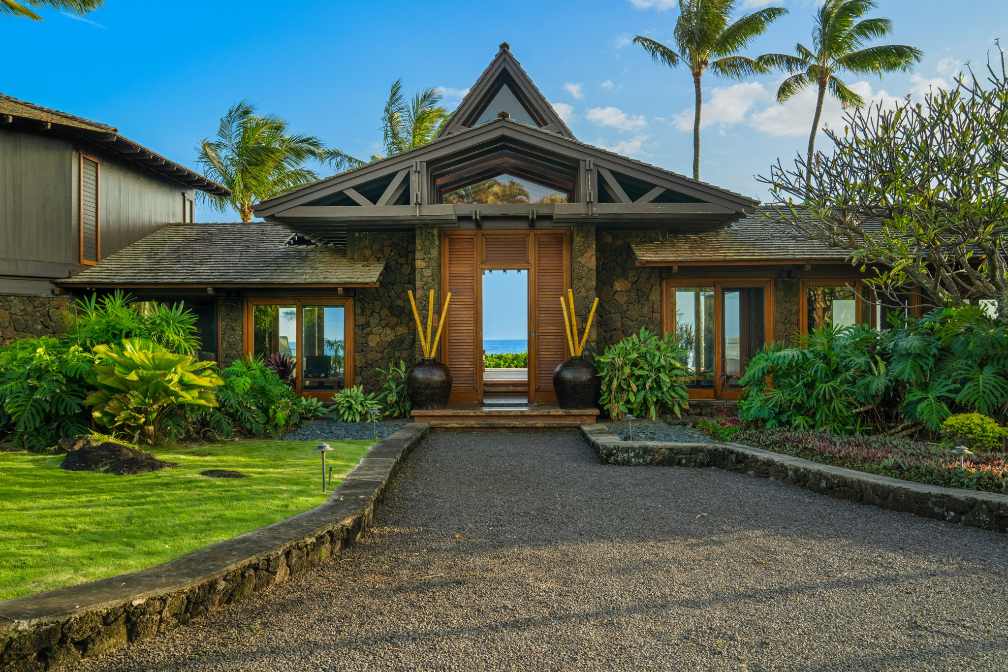 4914 Lawai Road Koloa, HI 96756 - Photo 1 of 2 a front view of a house with a yard