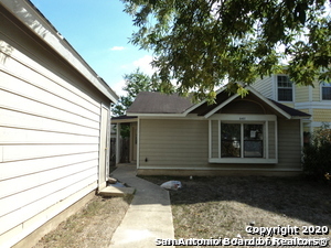 8401 Forest Ridge Drive San Antonio, TX 78239 - Photo 1 of 12 a front view of a house with a yard