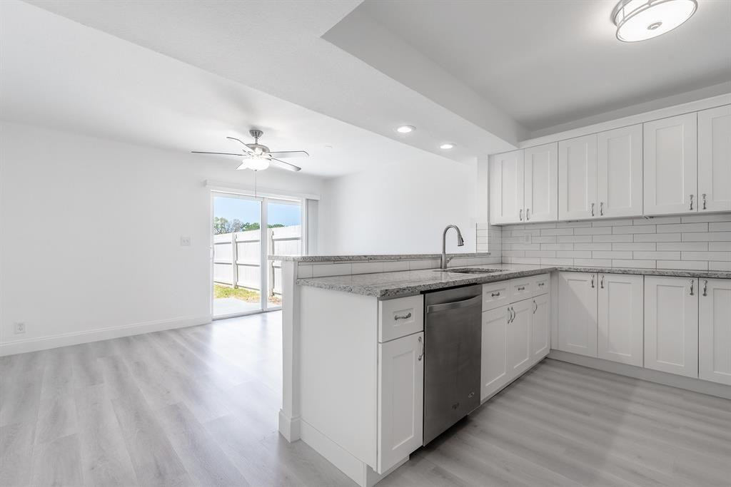 7500 Northwest 75th Street Fort Lauderdale, FL 33321 - Photo 14 of 16 a kitchen with sink and cabinets