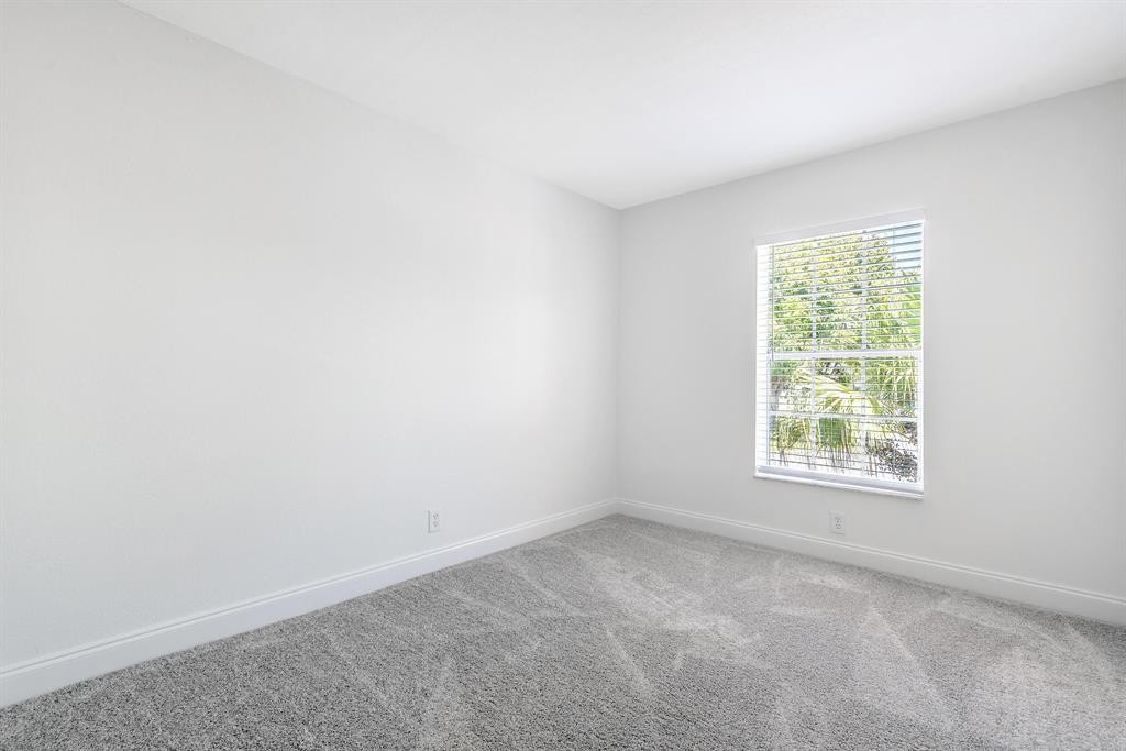 7500 Northwest 75th Street Fort Lauderdale, FL 33321 - Photo 2 of 16 an empty room with a window