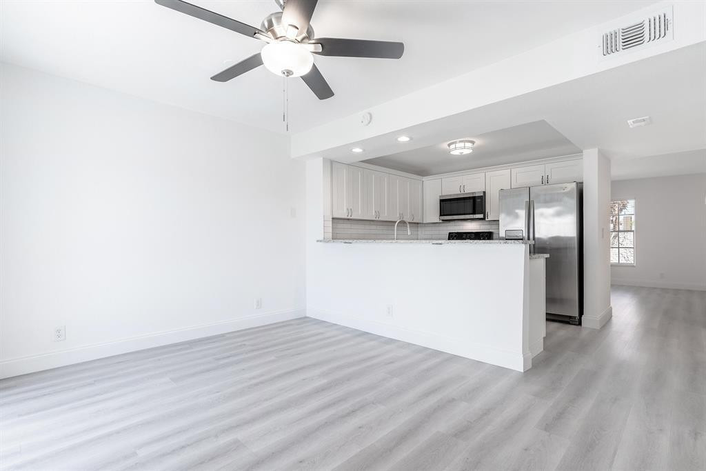 7500 Northwest 75th Street Fort Lauderdale, FL 33321 - Photo 10 of 16 a view of a kitchen with a sink and a refrigerator