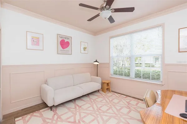 a living room with furniture and a window