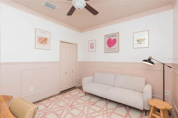 a bedroom with a bed and a couch