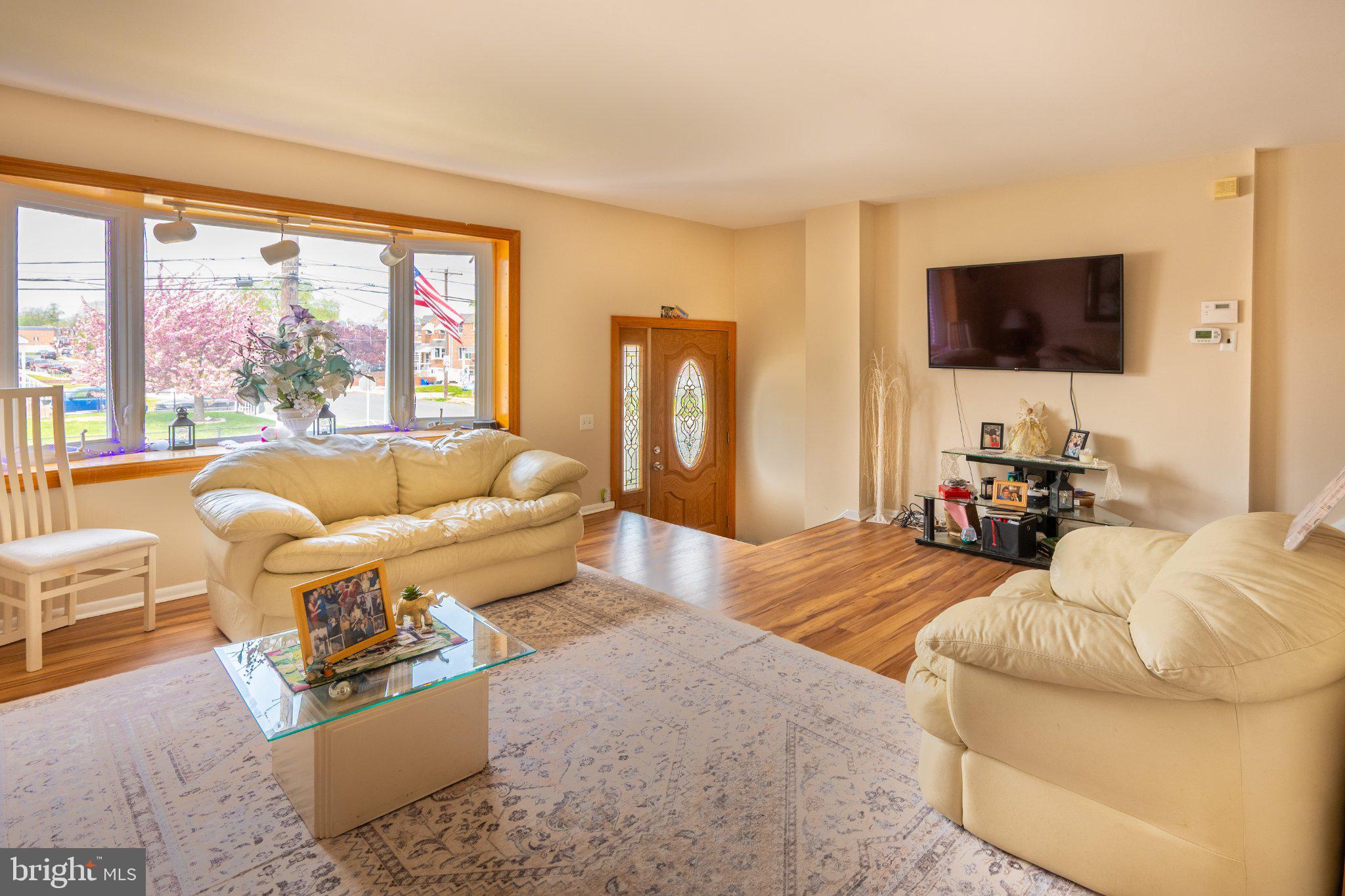 12307 Dunks Ferry Road Philadelphia, PA 19154 - Photo 3 of 31 a living room with furniture and a flat screen tv